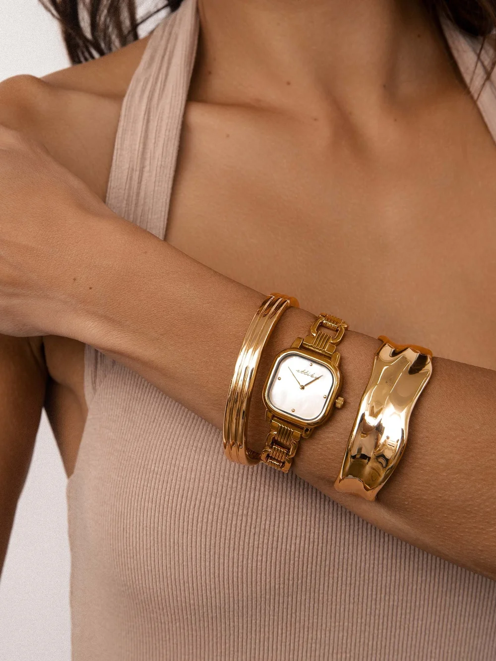 ettika elegant gold